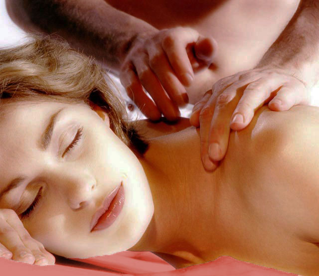 Woman enjoying a massage lying down on massage table